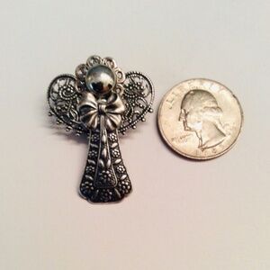 Hand crafted!  Adorable Angel pin.  Silver tones